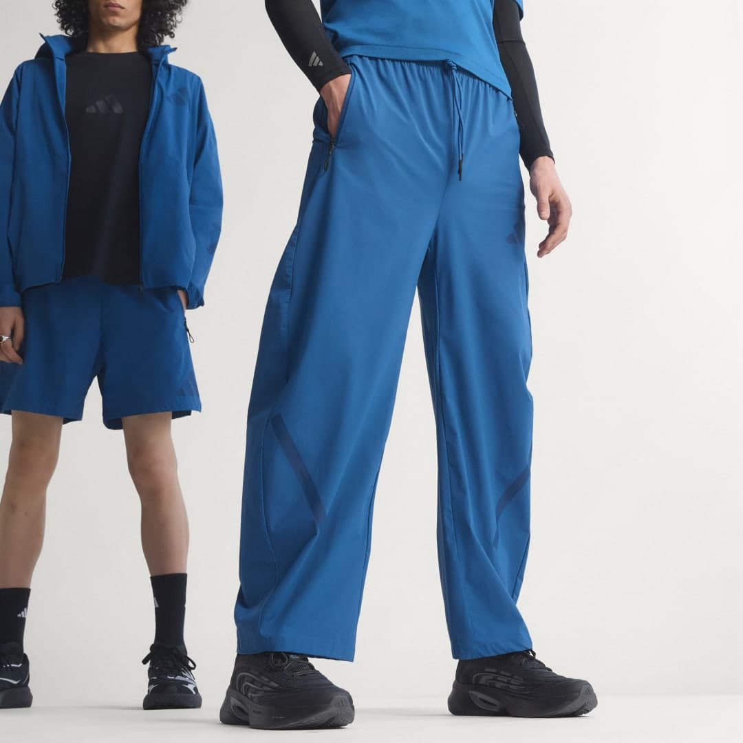 ADIDAS Z.N.E. SPODNIE Z TKANINY